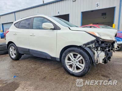 Czwarte zdjęcie samochodu z boku: 2010 HYUNDAI TUCSON GLS VIN:KM8JU3AC7AU056798 - miniatura