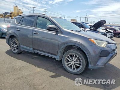 Czwarte zdjęcie samochodu z boku: 2017 TOYOTA RAV4 LE VIN:JTMZFREV5HJ121207 - miniatura