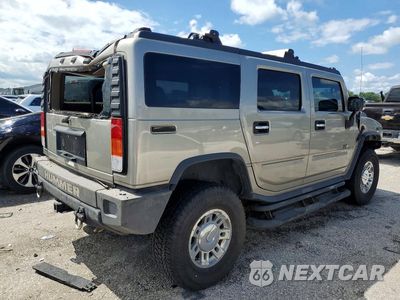 Trzecie zdjęcie samochodu z tyłu: 2004 HUMMER H2 VIN:5GRGN23U74H101214 - miniatura