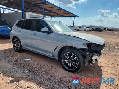 Czwarte zdjęcie samochodu z boku: 2022 BMW X3 XDRIVE30I VIN:5UX53DP05N9K55304 - miniatura
