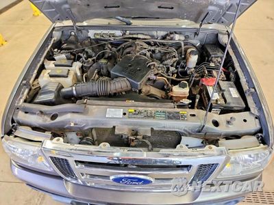Zdjęcie 11 z 12 samochodu: 2010 FORD RANGER SUPER CAB VIN:1FTLR4FE0APA52279 - miniatura