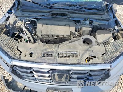 Zdjęcie 12 z 13 samochodu: 2025 HONDA PILOT TOURING VIN:5FNYG1H74SB174888 - miniatura