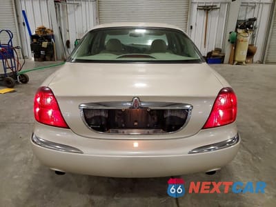 Zdjęcie 6 z 13 samochodu: 2002 LINCOLN CONTINENTAL VIN:1LNHM97V12Y650694 - miniatura