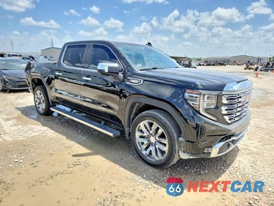Czwarte zdjęcie samochodu z boku: 2022 GMC SIERRA C1500 DENALI VIN:1GTPHGET2NZ559992 - miniatura