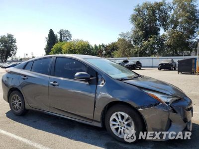 Czwarte zdjęcie samochodu z boku: 2017 TOYOTA PRIUS TWO VIN:JTDKBRFU5H3027559 - miniatura