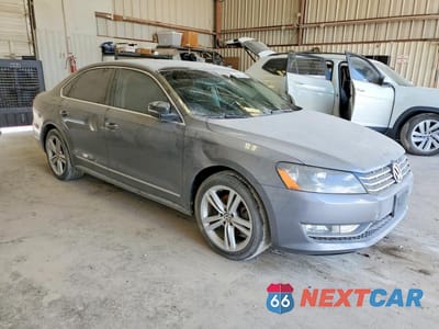 Czwarte zdjęcie samochodu z boku: 2014 VOLKSWAGEN PASSAT SEL VIN:1VWCN7A34EC045378 - miniatura