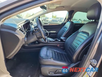 Zdjęcie 7 z 12 samochodu: 2014 FORD FUSION SE HYBRID VIN:3FA6P0LU2ER195519 - miniatura