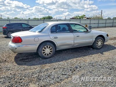 Trzecie zdjęcie samochodu z tyłu: 2000 LINCOLN CONTINENTAL VIN:1LNHM97V0YY764243 - miniatura