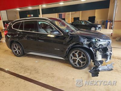 Czwarte zdjęcie samochodu z boku: 2017 BMW X1 XDRIVE28I VIN:WBXHT3Z38H4A58148 - miniatura