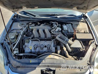 Zdjęcie 11 z 12 samochodu: 2006 FORD FUSION SE VIN:3FAHP07136R175239 - miniatura
