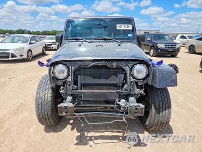 Piąte zdjęcie samochodu w środku: 2017 JEEP WRANGLER UNLIMITED SAHARA VIN:1C4HJWEG5HL685602 - miniatura