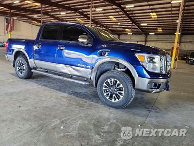 Czwarte zdjęcie samochodu z boku: 2017 NISSAN TITAN PLATINUM RESERVE VIN:1N6AA1E52HN570329 - miniatura