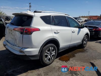 Trzecie zdjęcie samochodu z tyłu: 2018 TOYOTA RAV4 LE VIN:JTMZFREV8JJ183125 - miniatura
