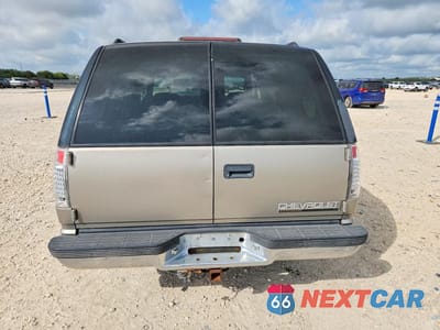Zdjęcie 6 z 13 samochodu: 1999 CHEVROLET TAHOE C1500 VIN:1GNEC13R4XJ435872 - miniatura
