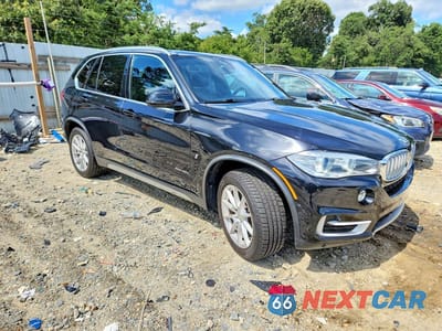 Czwarte zdjęcie samochodu z boku: 2018 BMW X5 XDR40E VIN:5UXKT0C50J0W03487 - miniatura