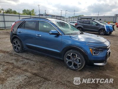 Czwarte zdjęcie samochodu z boku: 2025 KIA NIRO SX TOURING VIN:KNDCT3LE9S5217050 - miniatura