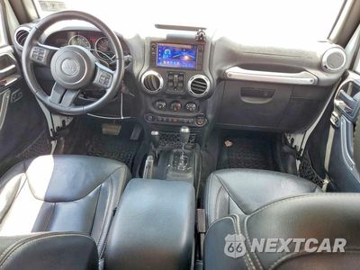 Zdjęcie 8 z 12 samochodu: 2015 JEEP WRANGLER UNLIMITED SAHARA VIN:1C4BJWEG7FL503529 - miniatura