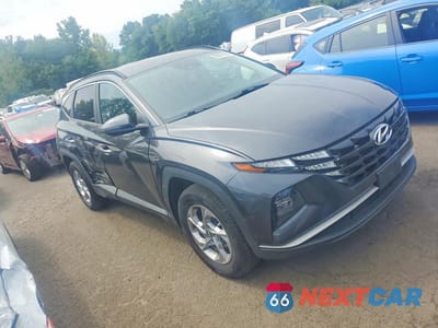 Czwarte zdjęcie samochodu z boku: 2022 HYUNDAI TUCSON SEL VIN:5NMJBCAEXNH094812 - miniatura