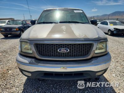 Piąte zdjęcie samochodu w środku: 2002 FORD F150 VIN:1FTRX18L02NB60389 - miniatura