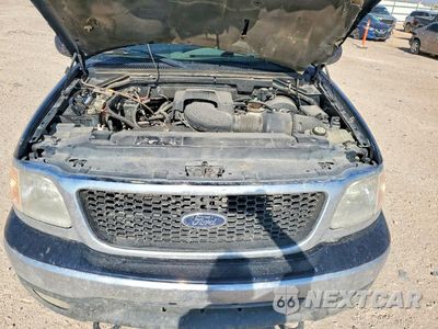 Zdjęcie 11 z 12 samochodu: 2002 FORD F150 SUPERCREW VIN:1FTRW08L22KC32661 - miniatura