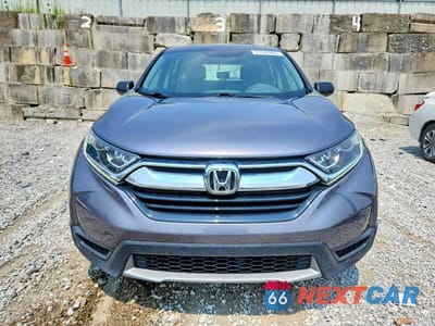 Piąte zdjęcie samochodu w środku: 2019 HONDA CR-V LX VIN:2HKRW6H3XKH225913 - miniatura
