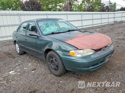 Czwarte zdjęcie samochodu z boku: 2000 CHEVROLET GEO PRIZM BASE VIN:1Y1SK5289YZ420801 - miniatura