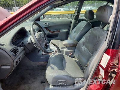Zdjęcie 7 z 13 samochodu: 2001 MITSUBISHI GALANT ES VIN:4A3AA46H61E048996 - miniatura