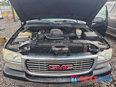 Zdjęcie 11 z 12 samochodu: 2003 GMC YUKON XL K1500 VIN:3GKFK16Z53G176322 - miniatura