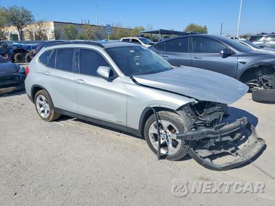 Czwarte zdjęcie samochodu z boku: 2014 BMW X1 SDRIVE28I VIN:WBAVM1C56EVW49526 - miniatura