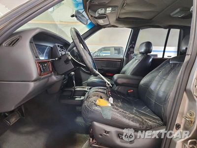 Zdjęcie 13 z 26 samochodu: 1998 JEEP GRAND CHEROKEE LIMITED 5.9L VIN:1J4GZ88Z8WC118109 - miniatura