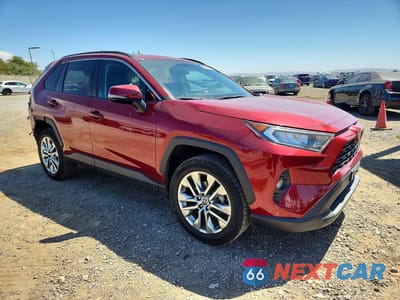 Czwarte zdjęcie samochodu z boku: 2019 TOYOTA RAV4 XLE PREMIUM VIN:2T3A1RFV8KW081045 - miniatura
