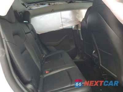 Zdjęcie 10 z 12 samochodu: 2022 TESLA MODEL Y VIN:7SAYGDEE0NF389938 - miniatura