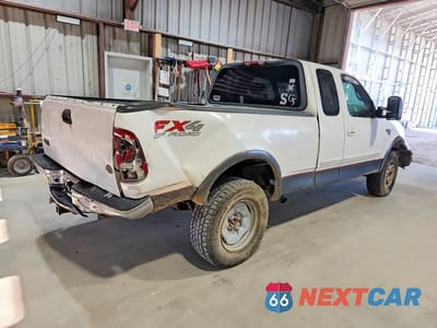 Trzecie zdjęcie samochodu z tyłu: 2002 FORD F150 VIN:1FTRX18L72NA83360 - miniatura