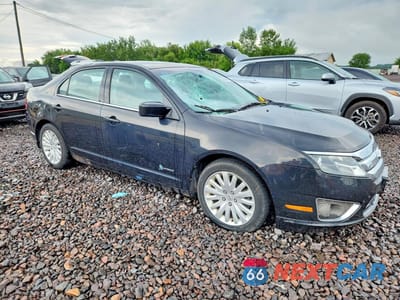 Czwarte zdjęcie samochodu z boku: 2011 FORD FUSION HYBRID VIN:3FADP0L35BR125989 - miniatura