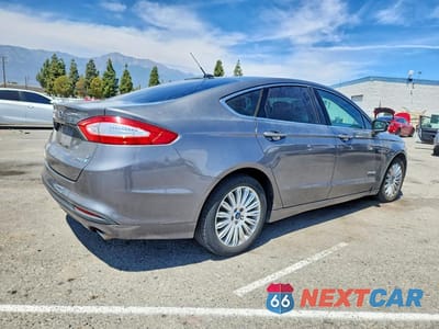 Trzecie zdjęcie samochodu z tyłu: 2014 FORD FUSION SE HYBRID VIN:3FA6P0LU2ER195519 - miniatura
