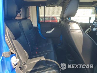 Zdjęcie 10 z 12 samochodu: 2014 JEEP WRANGLER UNLIMITED SAHARA VIN:1C4BJWEG7EL158713 - miniatura