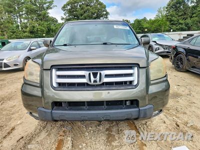 Piąte zdjęcie samochodu w środku: 2006 HONDA PILOT EX VIN:2HKYF18686H523598 - miniatura