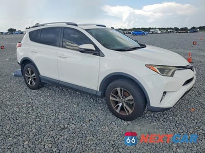 Czwarte zdjęcie samochodu z boku: 2016 TOYOTA RAV4 XLE VIN:JTMRFREV7GJ090234 - miniatura