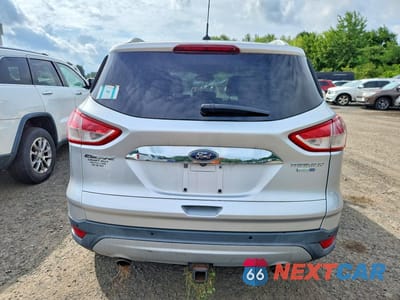 Zdjęcie 6 z 13 samochodu: 2016 FORD ESCAPE TITANIUM VIN:1FMCU9J98GUB90633 - miniatura