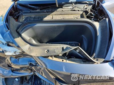 Zdjęcie 12 z 14 samochodu: 2022 TESLA MODEL Y VIN:7SAYGDEE0NF391706 - miniatura