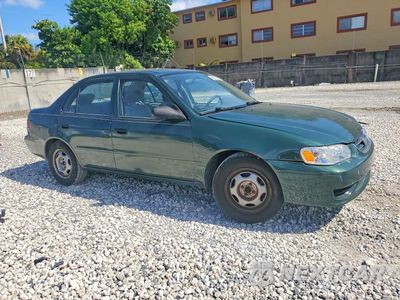 Czwarte zdjęcie samochodu z boku: 2001 TOYOTA COROLLA CE VIN:1NXBR12E61Z506385 - miniatura