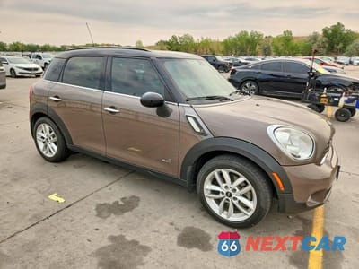 Czwarte zdjęcie samochodu z boku: 2013 MINI COOPER S COUNTRYMAN VIN:WMWZC5C53DWP34165 - miniatura