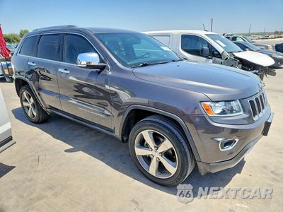 Czwarte zdjęcie samochodu z boku: 2014 JEEP GRAND CHEROKEE LIMITED VIN:1C4RJEBG4EC366089 - miniatura