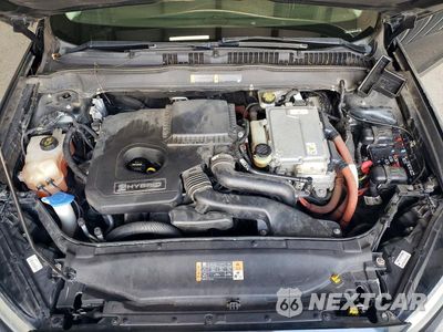 Zdjęcie 11 z 12 samochodu: 2014 FORD FUSION SE HYBRID VIN:3FA6P0LU4ER231498 - miniatura