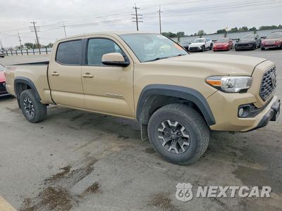 Czwarte zdjęcie samochodu z boku: 2020 TOYOTA TACOMA TRD OFF-ROAD VIN:3TMDZ5BN3LM088301 - miniatura