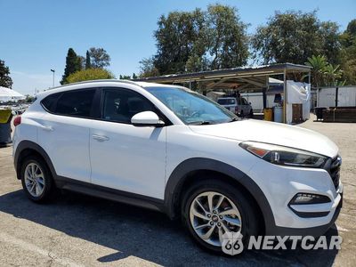 Czwarte zdjęcie samochodu z boku: 2016 HYUNDAI TUCSON SE VIN:KM8J33A48GU180213 - miniatura