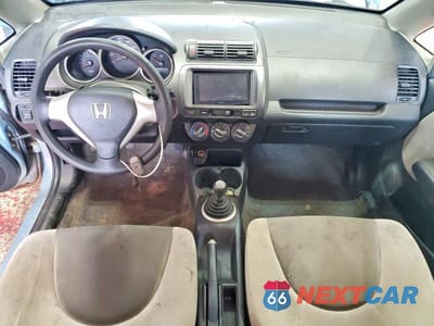 Zdjęcie 8 z 12 samochodu: 2007 HONDA FIT VIN:JHMGD37467S066952 - miniatura