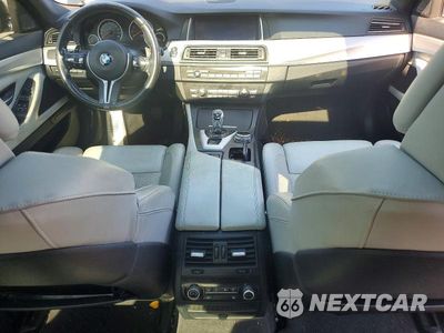 Zdjęcie 8 z 12 samochodu: 2014 BMW M5 VIN:WBSFV9C58ED097724 - miniatura