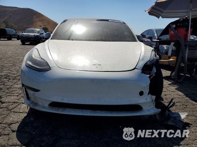 Piąte zdjęcie samochodu w środku: 2021 TESLA MODEL 3 VIN:5YJ3E1ECXMF072225 - miniatura