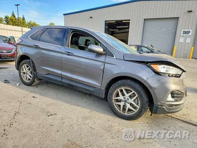 Czwarte zdjęcie samochodu z boku: 2022 FORD EDGE SEL VIN:2FMPK4J9XNBA41329 - miniatura